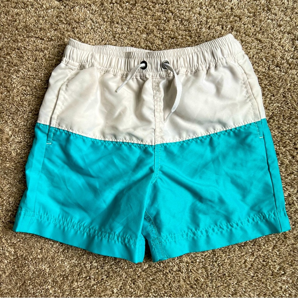 🆕 EUC Hanna Andersson teal and white colorblock swim trunks size 100
